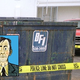The trash bin inside of which police found the mangled body of Detective Brown (inset).